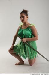 KATERINA KNNELING POSE WITH SWORD